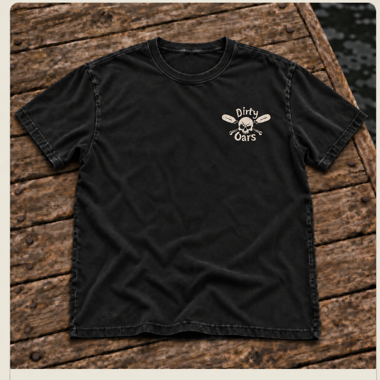 Front of the washed black Dock Rat Tee with a small Dirty Oars logo on the wearer’s left chest