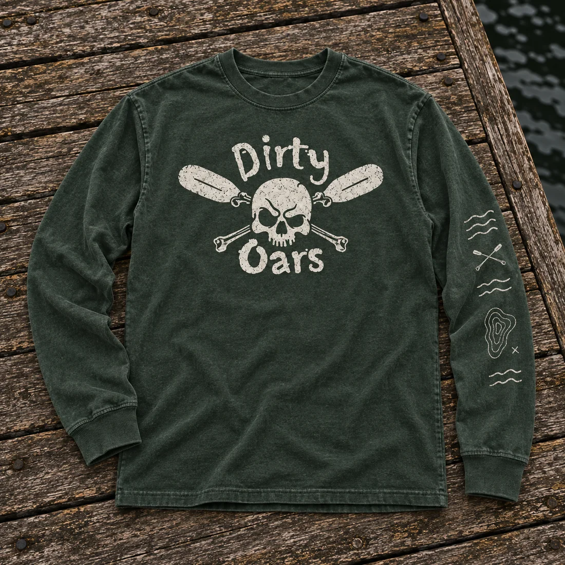 Front of the river-green Dirty Oars Low Water long sleeve with original skull-and-oars logo and sleeve field marks